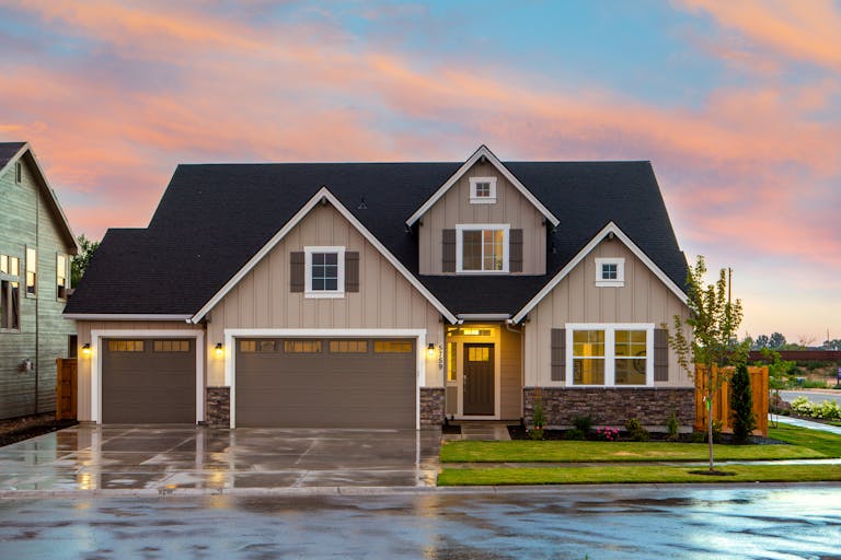 Charming family home in St Louis with a modern facade and spacious garage.